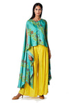 Shop light teal jaal printed cape with yellow pleated pants online in USA. Find a range of stunning designer dresses by Swati Vijaivargie in USA at Pure Elegance Indian clothing store. Elevate your traditional style with a range of designer silk sarees, Indian clothing, and much more also available at our online store.-full view