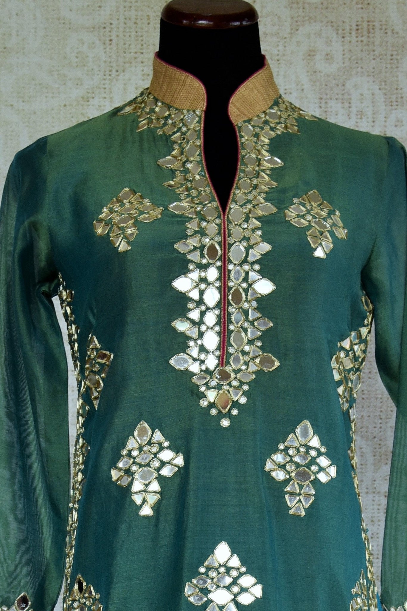 500867 Buy this ethnic Indian green suit with fancy band collar glass applique blue and fuchsia trim online or from our Pure Elegance store in USA. Perfect for wedding. Top View.