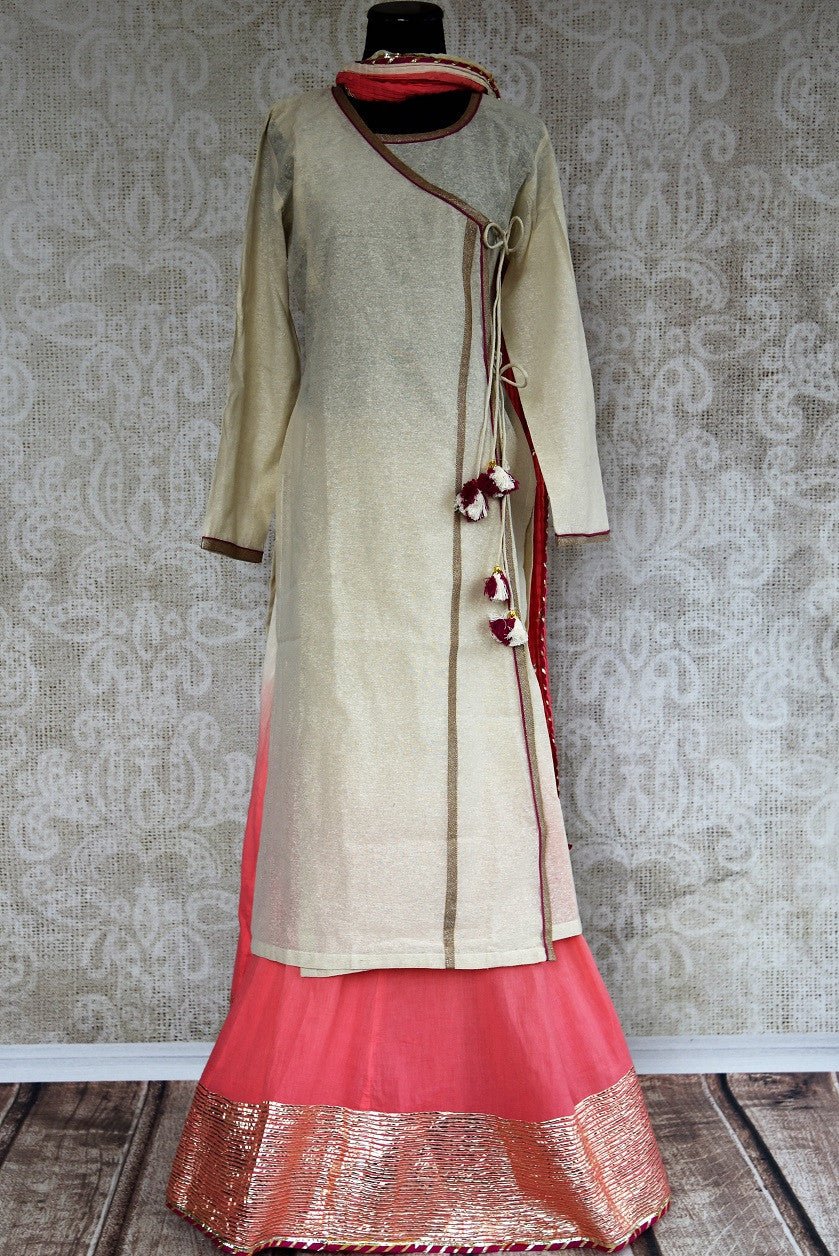 Buy this silk indian suit combination of beige kurti and pink palazzo pants with dupatta from pure elegance store,NJ. Great for parties and casual occasions-Full View