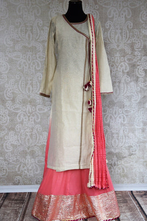 Buy this silk indian suit combination of beige kurti and pink palazzo pants with dupatta from pure elegance store,NJ. Great for parties and casual occasions-Pink Dupatta
