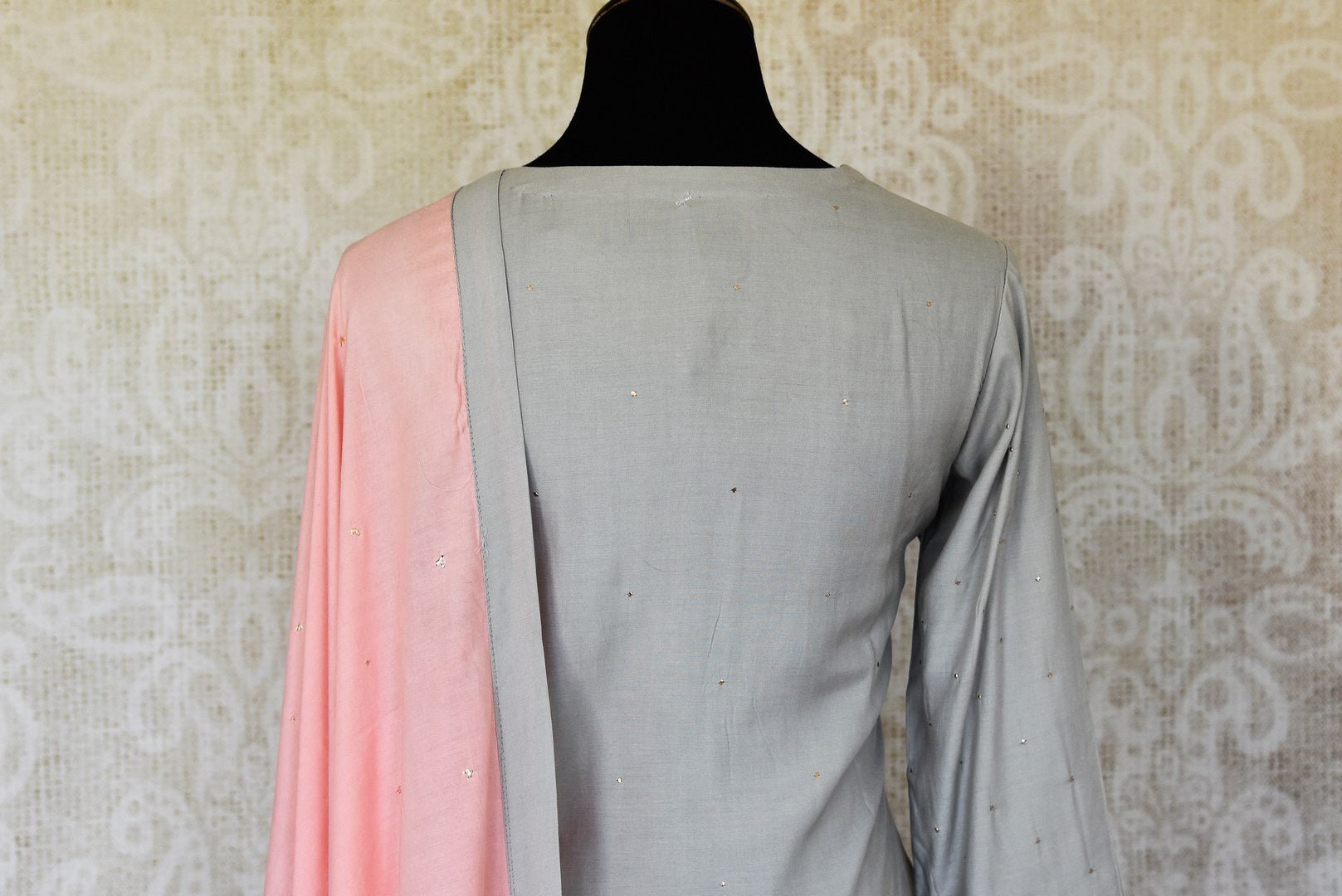 Shop grey and pink cotton silk palazzo suit online in USA with badla work and dupatta. Make fashionable choices with latest Indian designer clothing from Pure Elegance Indian fashion store in USA. Shop Indian salwar suits, designer Anarkali suits and bridal lehengas for Indian brides in USA from our online store.-back