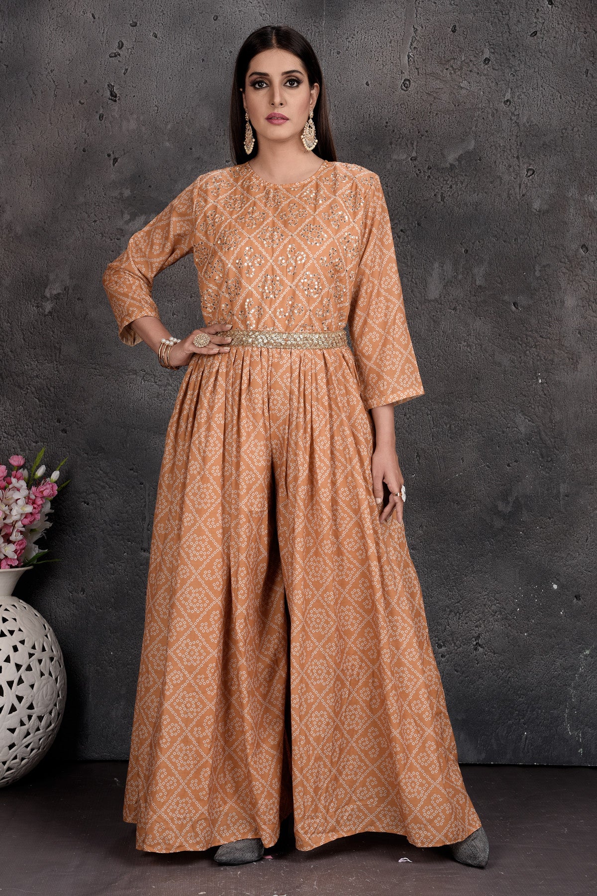 Shop stunning beige bandhej print jumpsuit online in USA. Set a fashion statement at parties in designer Indian dresses, Anarkali suits, designer lehengas, gowns, Indowestern dresses from Pure Elegance Indian fashion store in USA.-full view