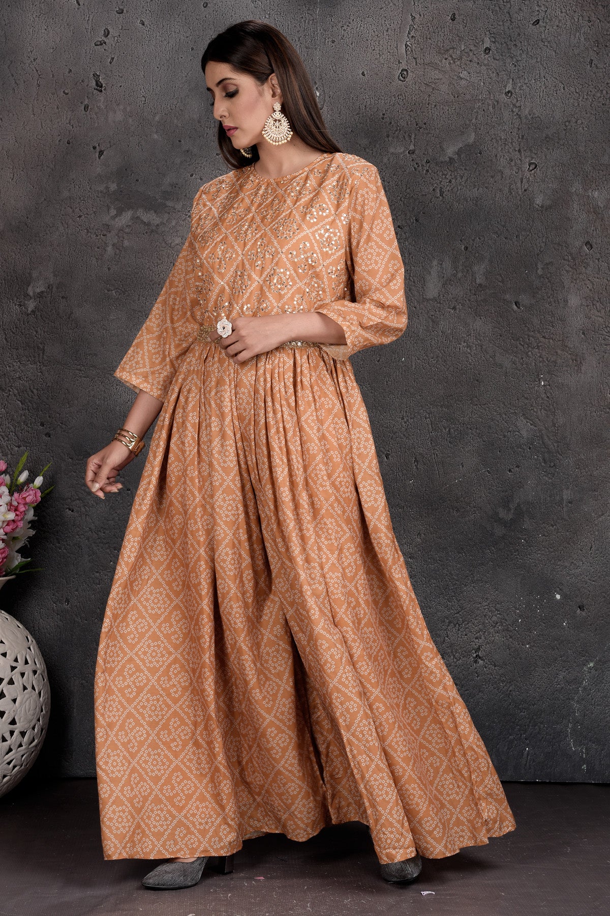 Shop stunning beige bandhej print jumpsuit online in USA. Set a fashion statement at parties in designer Indian dresses, Anarkali suits, designer lehengas, gowns, Indowestern dresses from Pure Elegance Indian fashion store in USA.-front