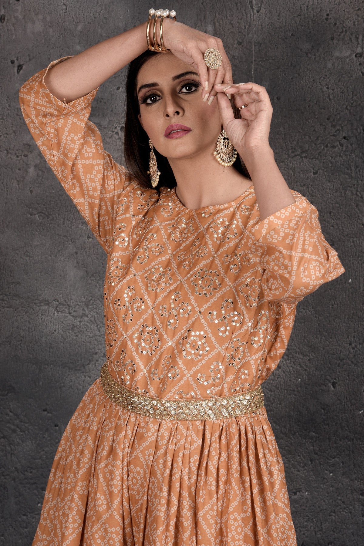 Shop stunning beige bandhej print jumpsuit online in USA. Set a fashion statement at parties in designer Indian dresses, Anarkali suits, designer lehengas, gowns, Indowestern dresses from Pure Elegance Indian fashion store in USA.-closeup