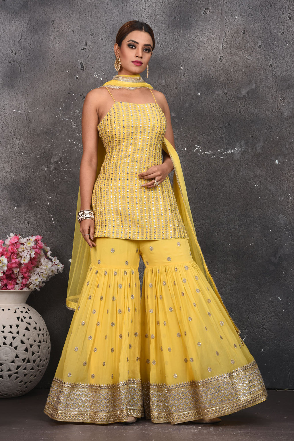 Shop beautiful light yellow embroidered designer gharara suit online in USA with dupatta. Look your best at weddings and special occasions in exclusive designer lehengas, Anarkali suits, sharara suits. designer gowns and Indian dresses from Pure Elegance Indian fashion store in USA.-full view