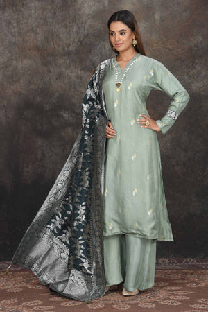 Shop beautiful sage green palazzo suit online in USA with Banarasi dupatta. Dazzle at sangeet and wedding occasions in this beautiful designer lehengas, Anarkali suits, sharara suit, bridal gowns, bridal lehengas from Pure Elegance Indian fashion store in USA.-side