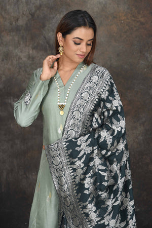 Shop beautiful sage green palazzo suit online in USA with Banarasi dupatta. Dazzle at sangeet and wedding occasions in this beautiful designer lehengas, Anarkali suits, sharara suit, bridal gowns, bridal lehengas from Pure Elegance Indian fashion store in USA.-closeup
