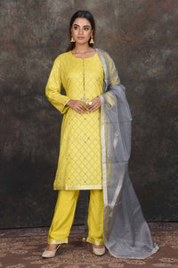 Buy stunning light yellow palazzo suit online in USA with grey dupatta. Dazzle at sangeet and wedding occasions in this beautiful designer lehengas, Anarkali suits, sharara suit, bridal gowns, bridal lehengas from Pure Elegance Indian fashion store in USA.-full view