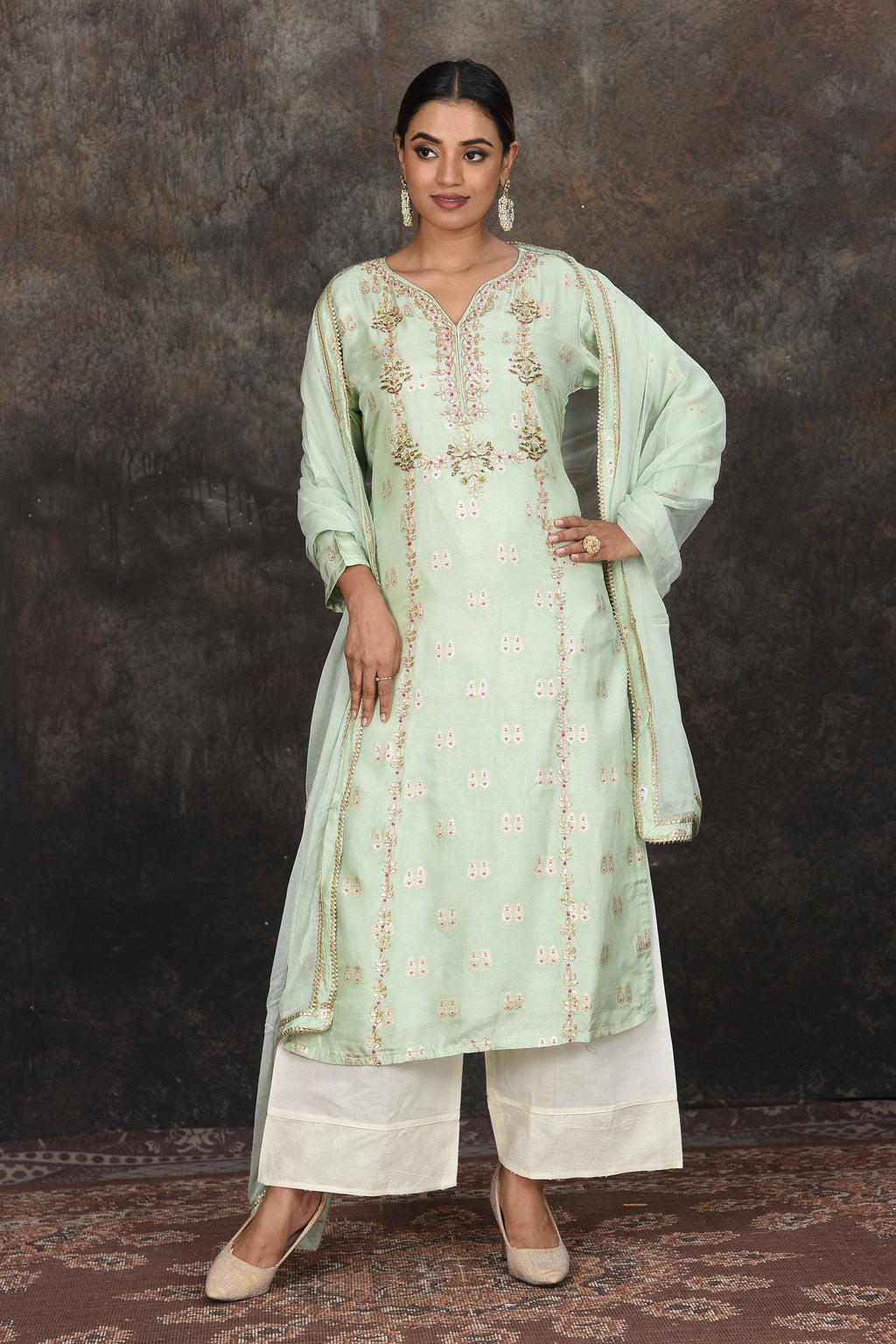 Shop beautiful mint green embroidered palazzo suit online in USA with dupatta. Dazzle at sangeet and wedding occasions in this beautiful designer lehengas, Anarkali suits, sharara suit, bridal gowns, bridal lehengas from Pure Elegance Indian fashion store in USA.-full view