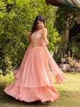 Buy stunning peach designer lehenga online in USA with cut-out blouse and dupatta. Dazzle on weddings and special occasions with exquisite Indian designer dresses, palazzo suits, Anarkali swsuits, wedding lehengas from Pure Elegance Indian fashion store in USA.-full view