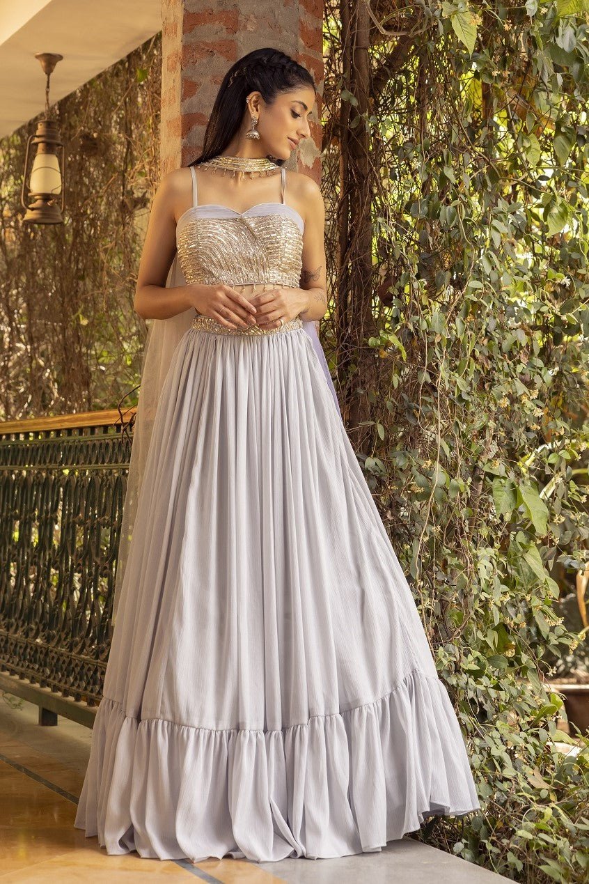 Indulge in the enchantment of our Chanel lehenga, meticulously designed for  the bride dreaming of a fairytale wedding. The lavish grey en... | Instagram