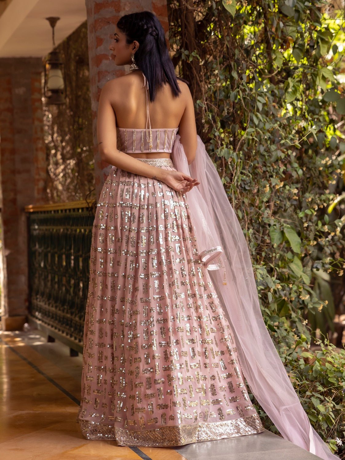 Shop stunning baby pink halter neck lehenga online in USA with dupatta. Dazzle on weddings and special occasions with exquisite Indian designer dresses, palazzo suits, Anarkali suits, wedding lehengas from Pure Elegance Indian fashion store in USA.-blouse back