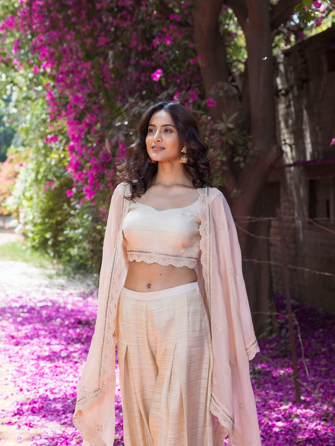 Shop beautiful peach crop top with palazzo and organza cape online in USA. Dazzle on weddings and special occasions with exquisite Indian designer dresses, sharara suits, Anarkali suits, wedding lehengas from Pure Elegance Indian fashion store in USA.-closeup