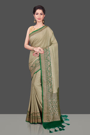 Pista green color soft banarasi silk saree with zari weaving work