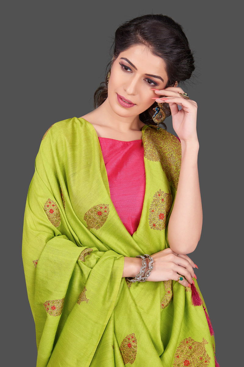 Shop pista green borderless muga Benarasi sari online in USA with zari buta. Shop beautiful Banarasi sarees, georgette sarees, pure muga silk sarees in USA from Pure Elegance Indian fashion boutique in USA. Get spoiled for choices with a splendid variety of Indian saris to choose from! Shop now.-closeup