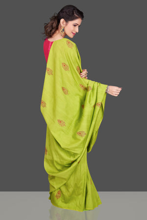 Shop pista green borderless muga Benarasi sari online in USA with zari buta. Shop beautiful Banarasi sarees, georgette sarees, pure muga silk sarees in USA from Pure Elegance Indian fashion boutique in USA. Get spoiled for choices with a splendid variety of Indian saris to choose from! Shop now.-back