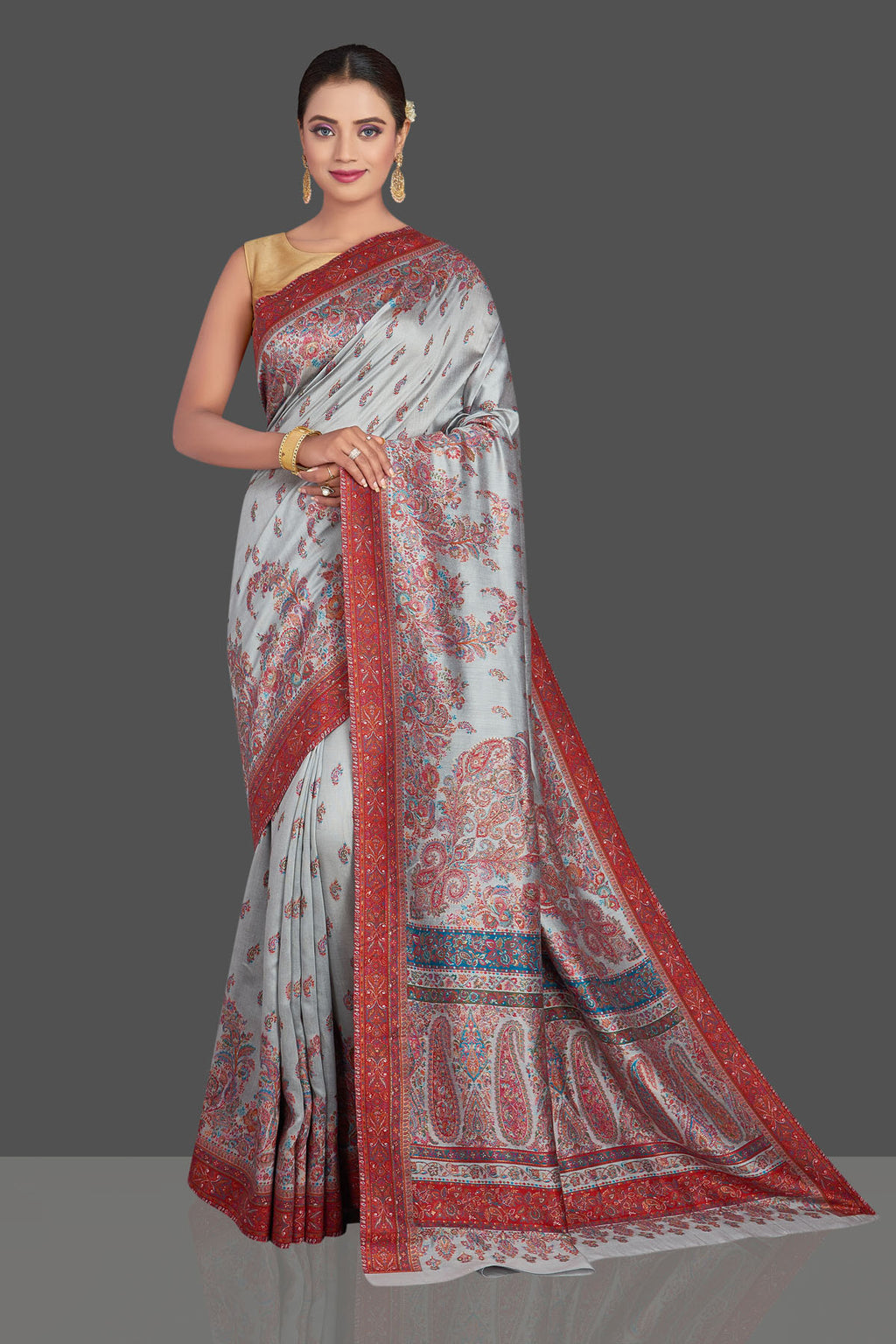 Shop gorgeous light grey tussar silk sari online in USA with Kani embroidery. Make your presence felt on special occasions in beautiful embroidered sarees, handwoven saris, pure silk saris, tussar sarees from Pure Elegance Indian saree store in USA.-full view