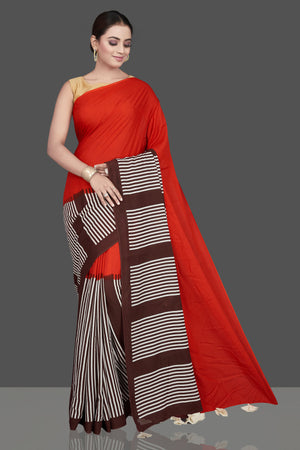 Shop stunning red and brown striped modal silk sari online in USA. Be the highlight of the occasion in beautiful pure silk saree, designer saris, handloom sarees, embroidered sarees, Kanchipuram sarees, Banarasi saris from Pure Elegance Indian saree store in USA.-front