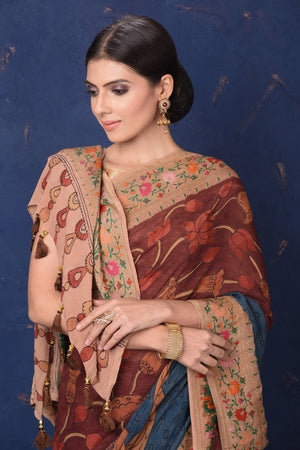 Cream color semi silk saree with maroon handwork