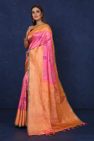 Shop stunning light pink Gadhwal silk Brocade sari online in USA with peach border. Set fashion goals on special occasions in exclusive silk sarees, Banarasi sarees, Kanjivaram sarees, handloom sarees, chiffon sarees, designer sarees from Pure Elegance Indian fashion store in USA.-pallu