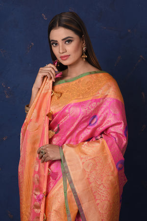 Shop stunning light pink Gadhwal silk Brocade sari online in USA with peach border. Set fashion goals on special occasions in exclusive silk sarees, Banarasi sarees, Kanjivaram sarees, handloom sarees, chiffon sarees, designer sarees from Pure Elegance Indian fashion store in USA.-closeup