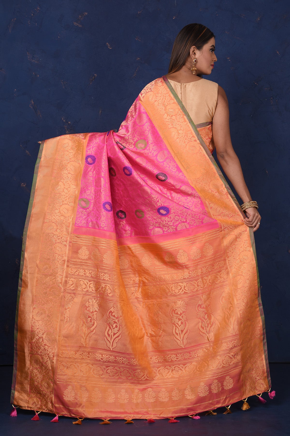 Shop stunning light pink Gadhwal silk Brocade sari online in USA with peach border. Set fashion goals on special occasions in exclusive silk sarees, Banarasi sarees, Kanjivaram sarees, handloom sarees, chiffon sarees, designer sarees from Pure Elegance Indian fashion store in USA.-back