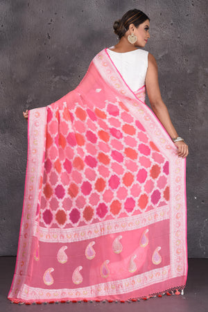 Buy beautiful pastel pink Banarasi silk saree online in USA with silver zari border. Keep your ethnic wardrobe up to date with latest designer saris, pure silk sarees, handwoven silk sarees, tussar silk sarees, Benarasi sarees, embroidered sarees from Pure Elegance Indian saree store in USA.-back