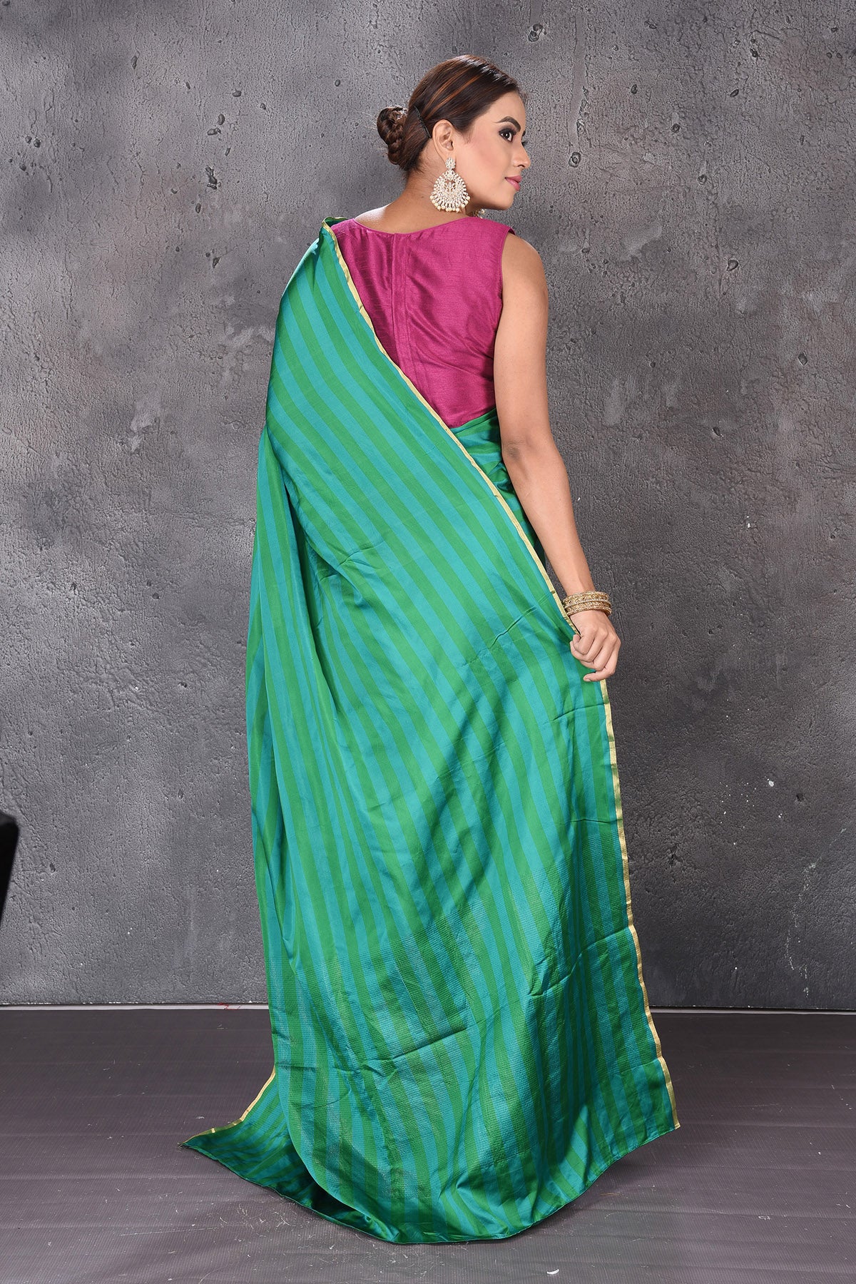 Buy stunning dark and light green stripes Mashru silk saree online in USA. Keep your ethnic wardrobe up to date with latest designer sarees, pure silk sarees, handwoven sarees, tussar silk sarees, embroidered sarees from Pure Elegance Indian saree store in USA.-back