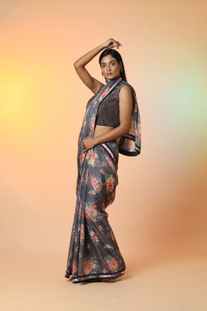 Buy stunning grey floral crepe saree online in USA with embellished saree blouse. Radiate glamor on special occasions in exquisite designer sarees, embroidered sarees, partywear saris, Bollywood sarees, fancy sarees from from Pure Elegance Indian saree store in USA.-side