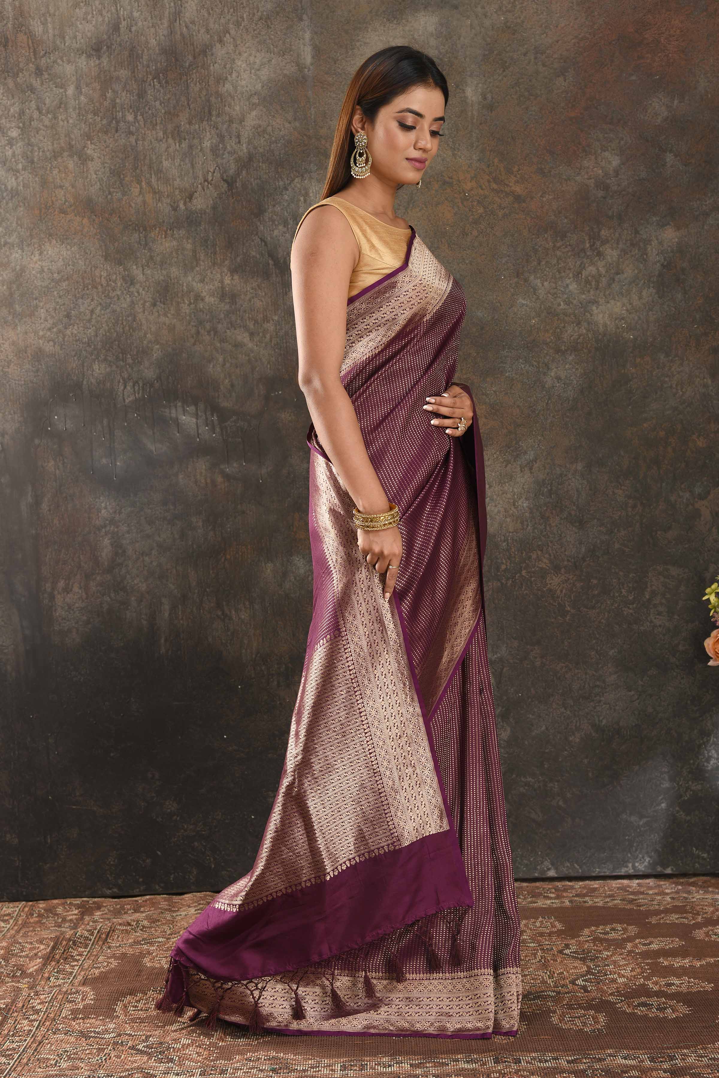 Shop stunning purple silk saree online in USA with antique zari border. Be vision of elegance on special occasions in exquisite designer sarees, handwoven sarees, georgette sarees, embroidered sarees, Banarasi saree, pure silk saris from Pure Elegance Indian saree store in USA.-side