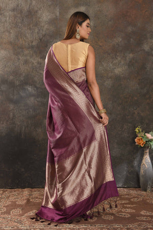 Shop stunning purple silk saree online in USA with antique zari border. Be vision of elegance on special occasions in exquisite designer sarees, handwoven sarees, georgette sarees, embroidered sarees, Banarasi saree, pure silk saris from Pure Elegance Indian saree store in USA.-back