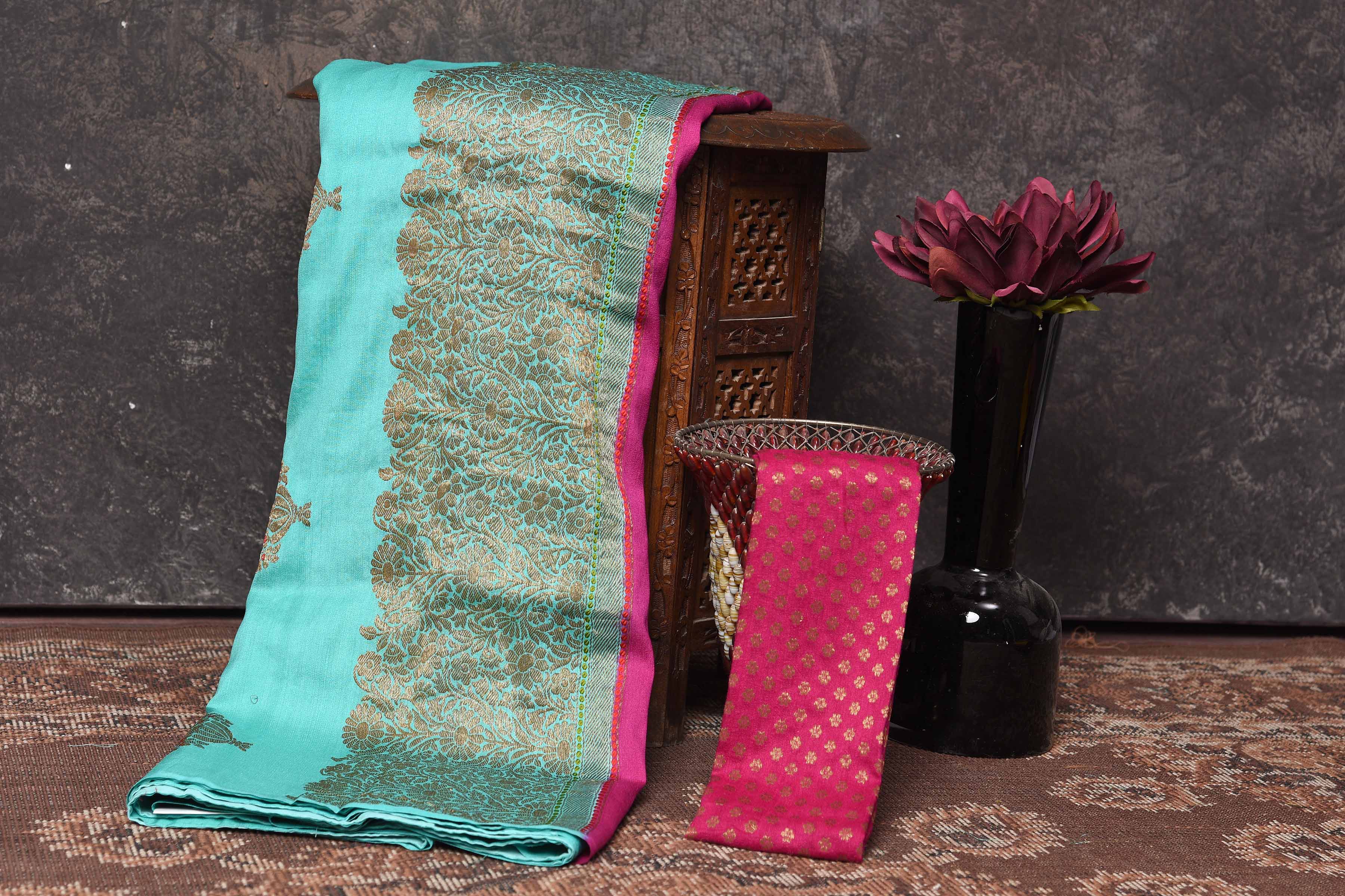 Shop stunning pastel blue Muga Banarasi sari online in USA with antique zari tree buta. Be vision of elegance on special occasions in exquisite designer sarees, handwoven sarees, georgette sarees, embroidered sarees, Banarasi saree, pure silk saris from Pure Elegance Indian saree store in USA.-blouse