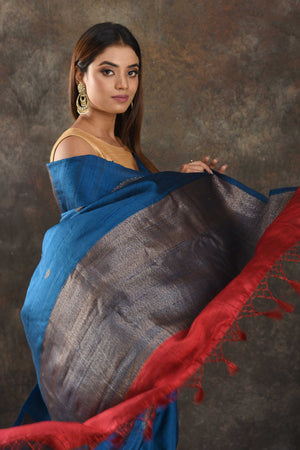 Buy royal blue tussar Banarasi sari online in USA with antiquqe zari buta. Be vision of elegance on special occasions in exquisite designer sarees, handwoven sarees, georgette sarees, embroidered sarees, Banarasi saree, pure silk saris from Pure Elegance Indian saree store in USA.-closeup