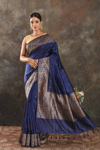 Shop beautiful dark blue tussar Banarasi saree online in USA with antique zari border. Be vision of elegance on special occasions in exquisite designer sarees, handwoven sarees, georgette sarees, embroidered sarees, Banarasi saree, pure silk saris, tussar sarees from Pure Elegance Indian saree store in USA.-full view