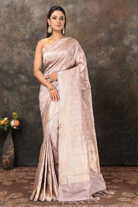 Shop light grey Banarasi sari online in USA with silver minakari zari work. Look royal at weddings and festive occasions in exquisite Banarasi saris, handwoven sarees, tussar silk sarees, Bollywood sarees, partywear sarees from Pure Elegance Indian saree store in USA.-full view