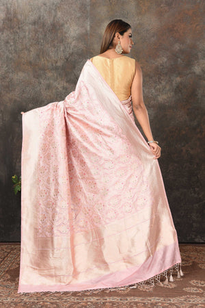 Buy powder pink Banarasi saree online in USA with silver minakari zari work. Look royal at weddings and festive occasions in exquisite Banarasi saris, handwoven sarees, tussar silk sarees, Bollywood sarees, partywear sarees from Pure Elegance Indian saree store in USA.-back