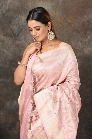 Buy powder pink Banarasi saree online in USA with silver minakari zari work. Look royal at weddings and festive occasions in exquisite Banarasi saris, handwoven sarees, tussar silk sarees, Bollywood sarees, partywear sarees from Pure Elegance Indian saree store in USA.-closeup