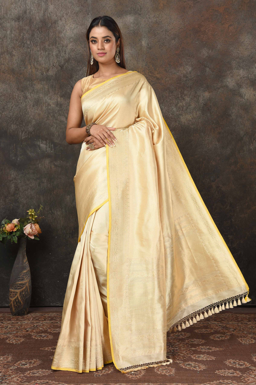 Buy stunning yellow Banarasi silk sari online in USA with zari work. Radiate elegance on special occasions in exquisite designer sarees, handwoven sarees, georgette sarees, embroidered sarees, Banarasi saree, pure silk saris, tussar sarees from Pure Elegance Indian saree store in USA.-full view