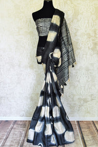 Buy stunning black and cream shibori print tussar silk saree online in USA. Look elegant on special occasions in beautiful printed sarees, silk sarees, tussar sarees, handloom sarees, Kanchipuram sarees from Pure Elegance Indian saree store in USA.-full view