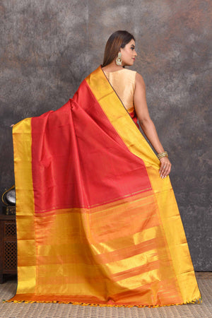 Shop beautiful red Kanjivaram silk saree online in USA with golden border. Get festive ready in beautiful Kanchipuram silk sarees, pure silk sarees, soft silk sarees, tussar silk saris, handwoven sarees, chanderi silk sarees from Pure Elegance Indian saree store in USA.-back