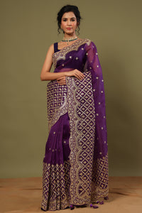 Buy purple organza silk saree online in USA with embroidered scalloped border. Make a fashion statement at weddings with stunning designer sarees, embroidered sarees with blouse, wedding sarees, handloom sarees from Pure Elegance Indian fashion store in USA.-full view