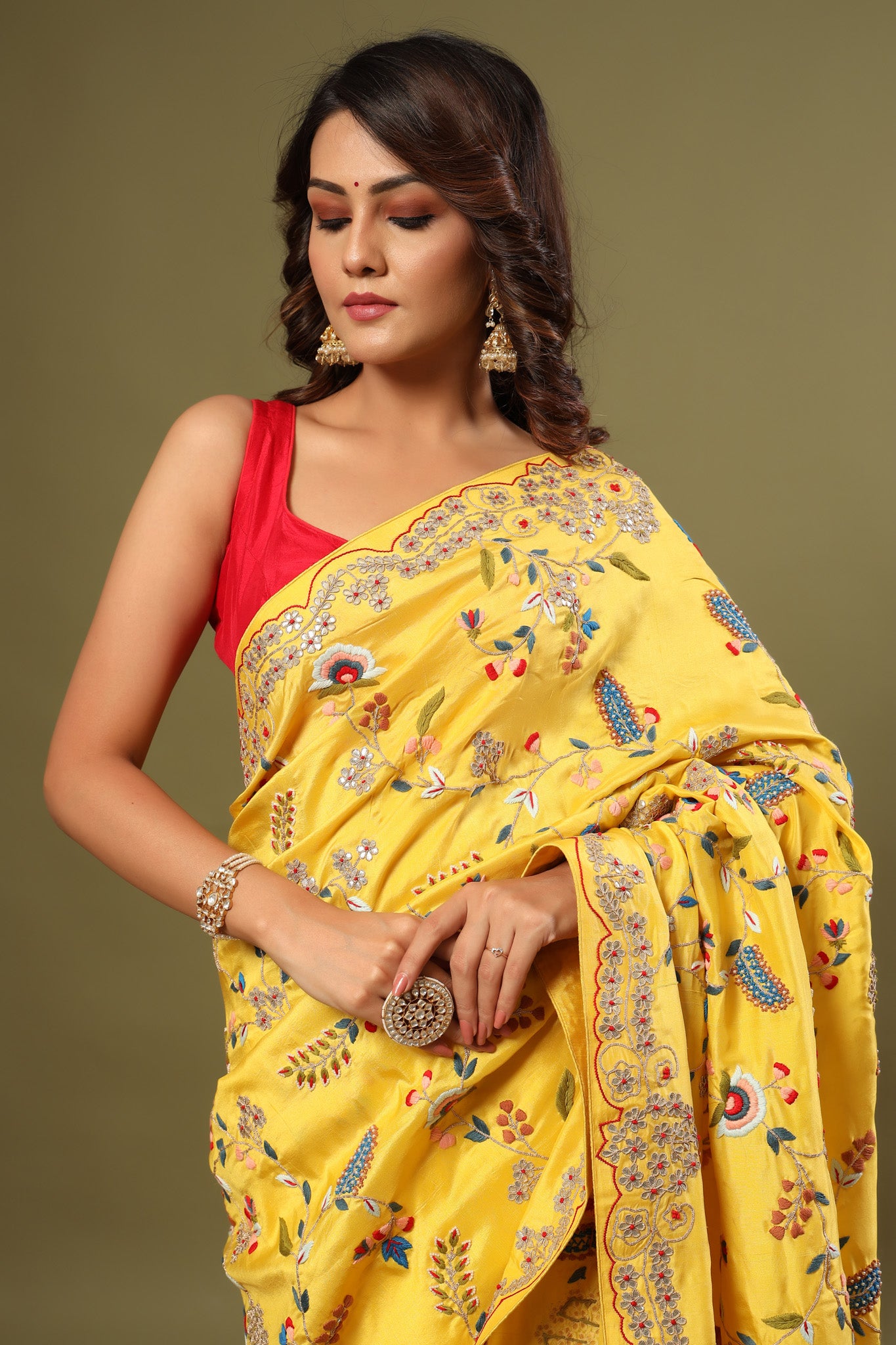 Buy yellow heavy embroidery tussar georgette sari online in USA. Make a fashion statement at weddings with stunning designer sarees, embroidered sarees with blouse, wedding sarees, handloom sarees from Pure Elegance Indian fashion store in USA.-saree