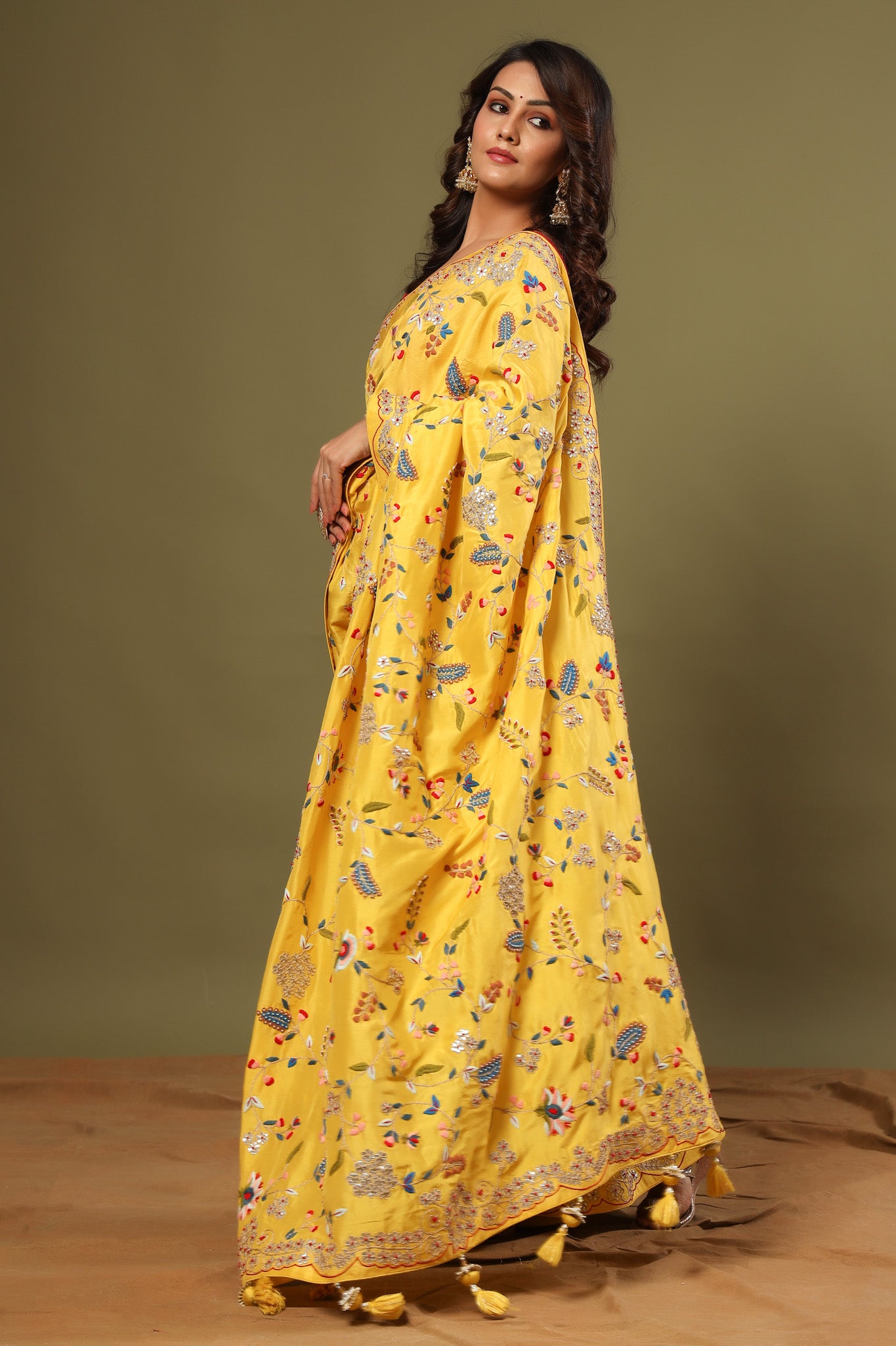 Buy yellow heavy embroidery tussar georgette sari online in USA. Make a fashion statement at weddings with stunning designer sarees, embroidered sarees with blouse, wedding sarees, handloom sarees from Pure Elegance Indian fashion store in USA.-pallu