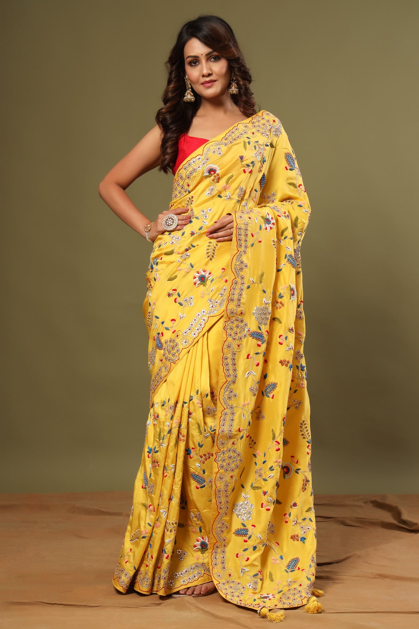 Buy yellow heavy embroidery tussar georgette sari online in USA. Make a fashion statement at weddings with stunning designer sarees, embroidered sarees with blouse, wedding sarees, handloom sarees from Pure Elegance Indian fashion store in USA.-front