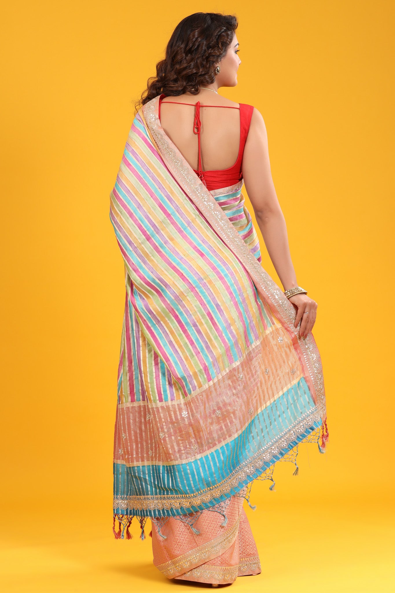 Buy pastel multicolor tussar silk sari online in USA with embroidered zari border. Make a fashion statement at weddings with stunning designer sarees, embroidered sarees with blouse, wedding sarees, handloom sarees from Pure Elegance Indian fashion store in USA.-back