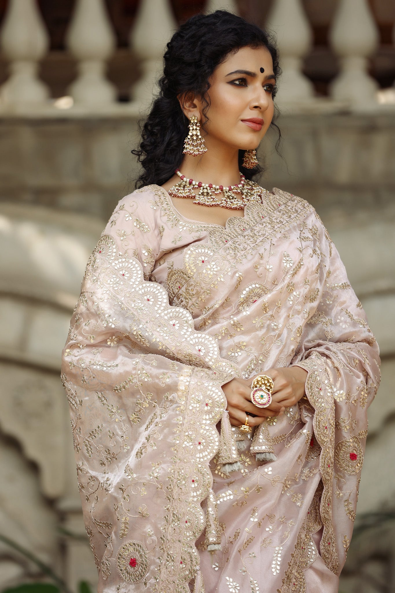 Buy stunning cream heavy embroidery tissue silk saree online in USA with saree blouse. Make a fashion statement at weddings with stunning designer sarees, embroidered sarees with blouse, wedding sarees, handloom sarees from Pure Elegance Indian fashion store in USA.-closeup