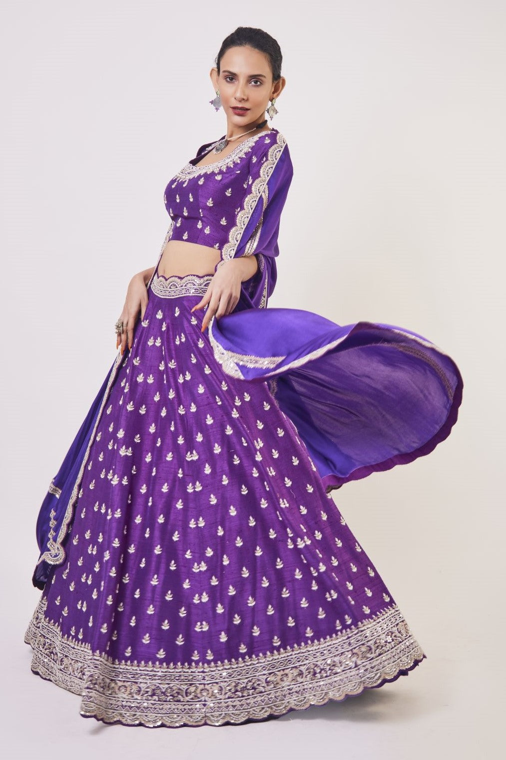 Buy beautiful purple lehenga online in USA with dupatta. Get festive ready in beautiful designer Anarkali suits, designer lehenga, wedding gowns, sharara suits, designer sarees from Pure Elegance Indian fashion store in USA.-full view