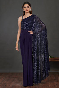 Buy stunning navy blue shimmery saree gown online in USA. Make a fashion statement on festive occasions and weddings with designer suits, Indian dresses, Anarkali suits, palazzo suits, designer gowns, sharara suits from Pure Elegance Indian fashion store in USA.-full view