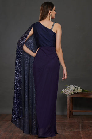 Buy stunning navy blue shimmery saree gown online in USA. Make a fashion statement on festive occasions and weddings with designer suits, Indian dresses, Anarkali suits, palazzo suits, designer gowns, sharara suits from Pure Elegance Indian fashion store in USA.-back