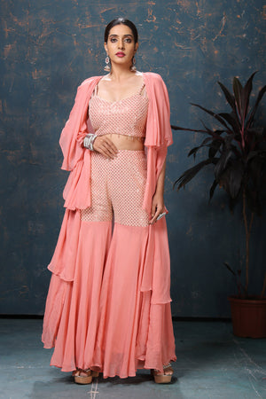 Shop gorgeous peach embroidered three piece palazzo suit online in USA with cape. Flaunt Indian style at parties and weddings in beautiful designer dresses, salwar suits, Anarkali suits, gowns, palazzo suits from Pure Elegance Indian fashion store in USA.-palazzo